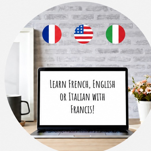 Laptop on a desk with French, American and Italian flags